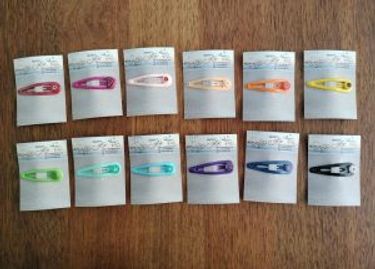 Rainbow Pack of 12 Metal Snap Hairclips Featuring Millefiori Glass Accents from Created by Kat - Hero Image