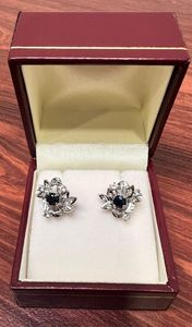 Pair of Silver & Sapphire Earrings Donated by The Niemes Family - Hero Image