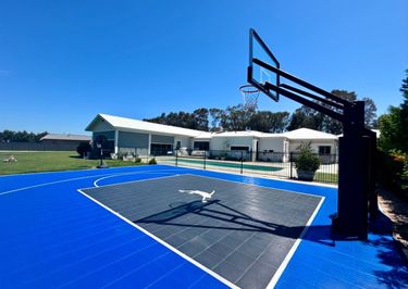Sports Courts Victoria - Slam Man Basketball Court, Ring and Installation! - Hero Image