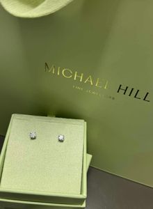 0.60 Carat TW Round Brilliant Laboratory Grown Diamond Solitaire Stud Earrings in 10k White Gold - Hero Image